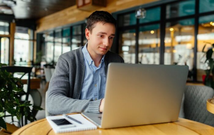 lawyer working on his laptop from a coffee shop